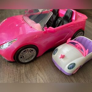 2 Barbie cars